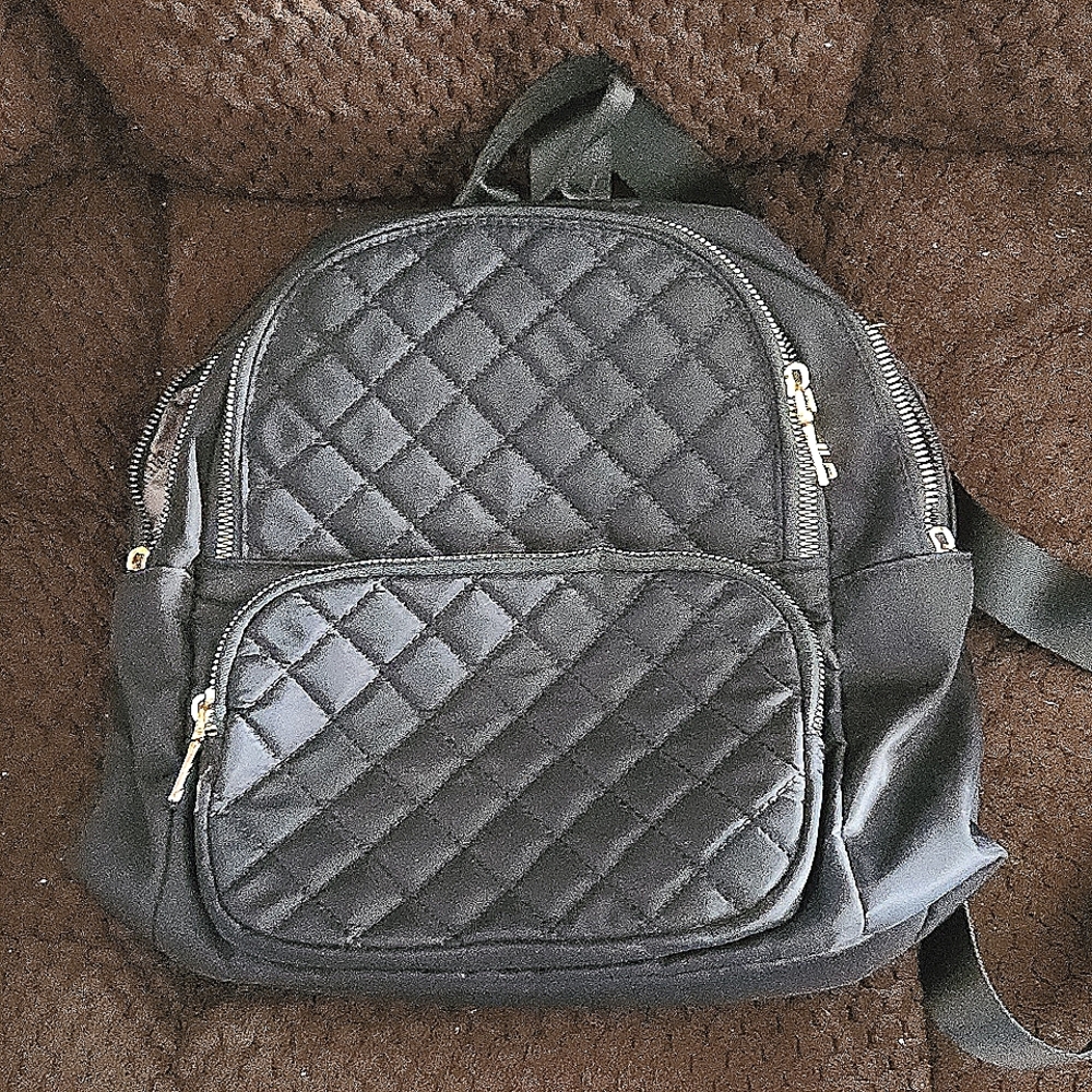 Black Quilted medium size 11x11x4 Backpack Purse bag Mukaite gold hardware